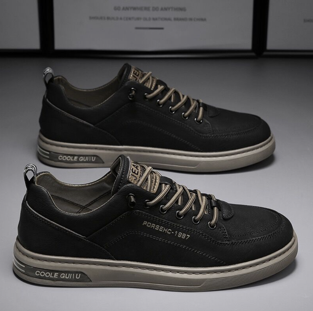 男性の靴の春の新型の通気性の小さい白い靴の男子学生の潮流の百合の布の靴の運動のレジャー板の靴のファッション靴